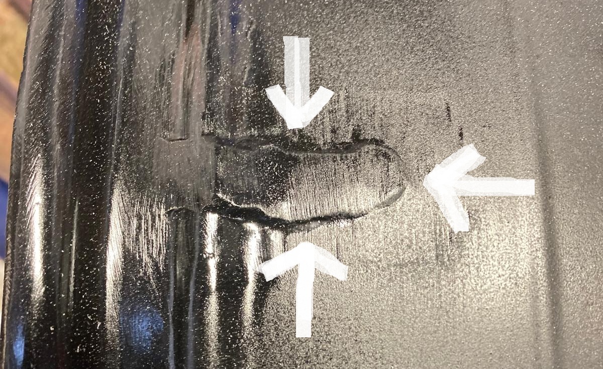 Jaguar with Pothole Damaged Wheel